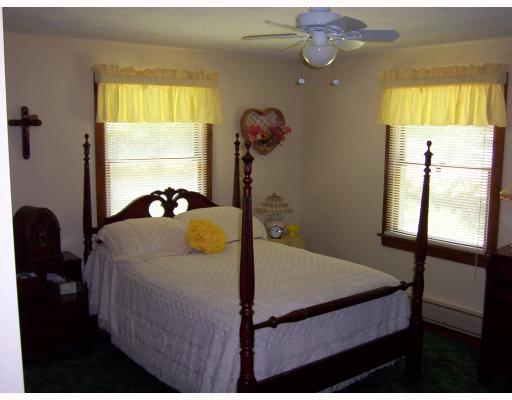 20 Pond Meadow Road Charlestown, RI 02813 - Photo 5 of 12 Master Bedroom. Nice cross ventilation and a ceiling fan in the masterbedroom. Double closet and a master bathroom with shower for convenience.