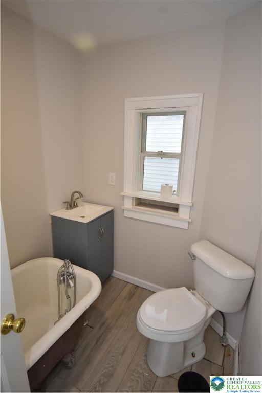 1105 Lehigh Street Easton, PA 18042 - Photo 6 of 9 a bathroom with a toilet sink and mirror