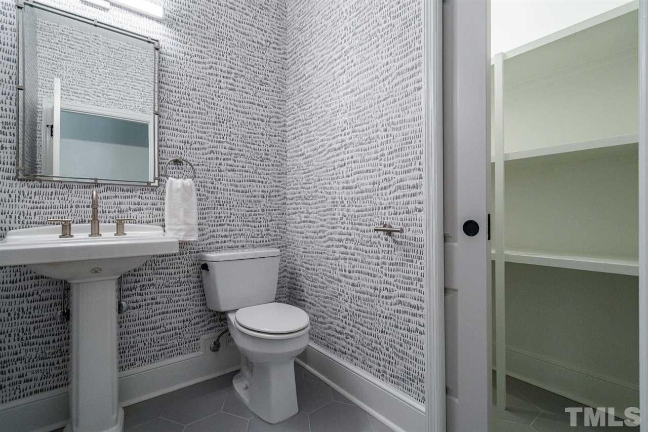 2005 Banbury Road Raleigh, NC 27608 - Photo 15 of 30 Chic Powder Room features a nice-sized Linen Closet.