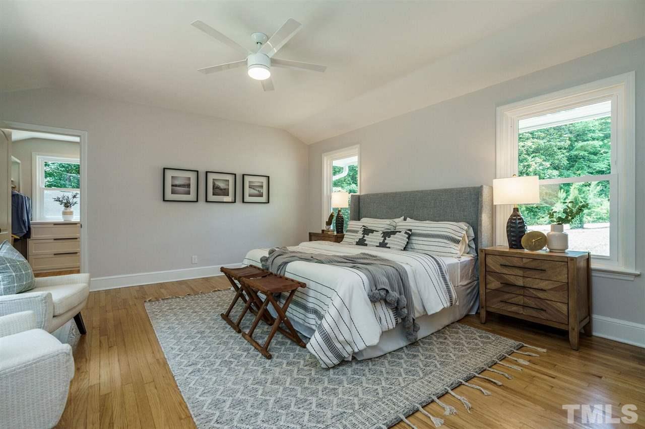 2005 Banbury Road Raleigh, NC 27608 - Photo 18 of 30 Lots of light floods this Owner's Bedroom, a Vaulted Ceiling, gorgeous Hardwood Floors. Plenty of space for large furniture. New Windows