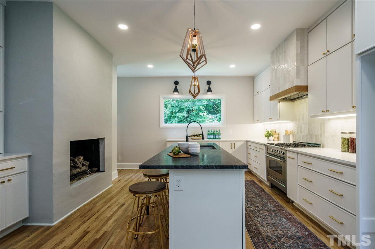 2005 Banbury Road Raleigh, NC 27608 - Photo 9 of 30 The Dining Room looks out over the lush private gardens. Hardwood floors .