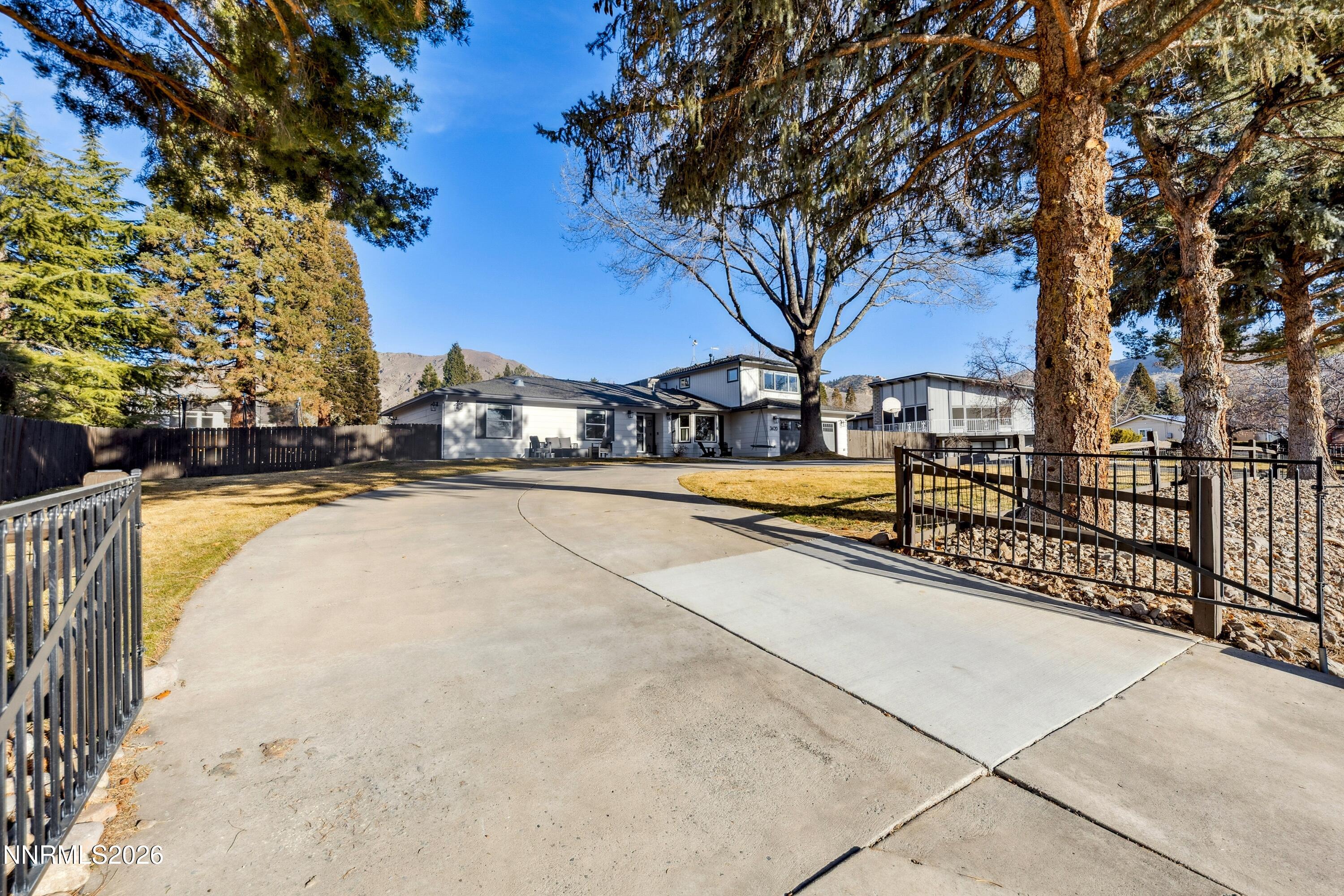 3620 East Hidden Valley Drive Reno, NV 89502 - Photo 10 of 67 a view of swimming pool with trees