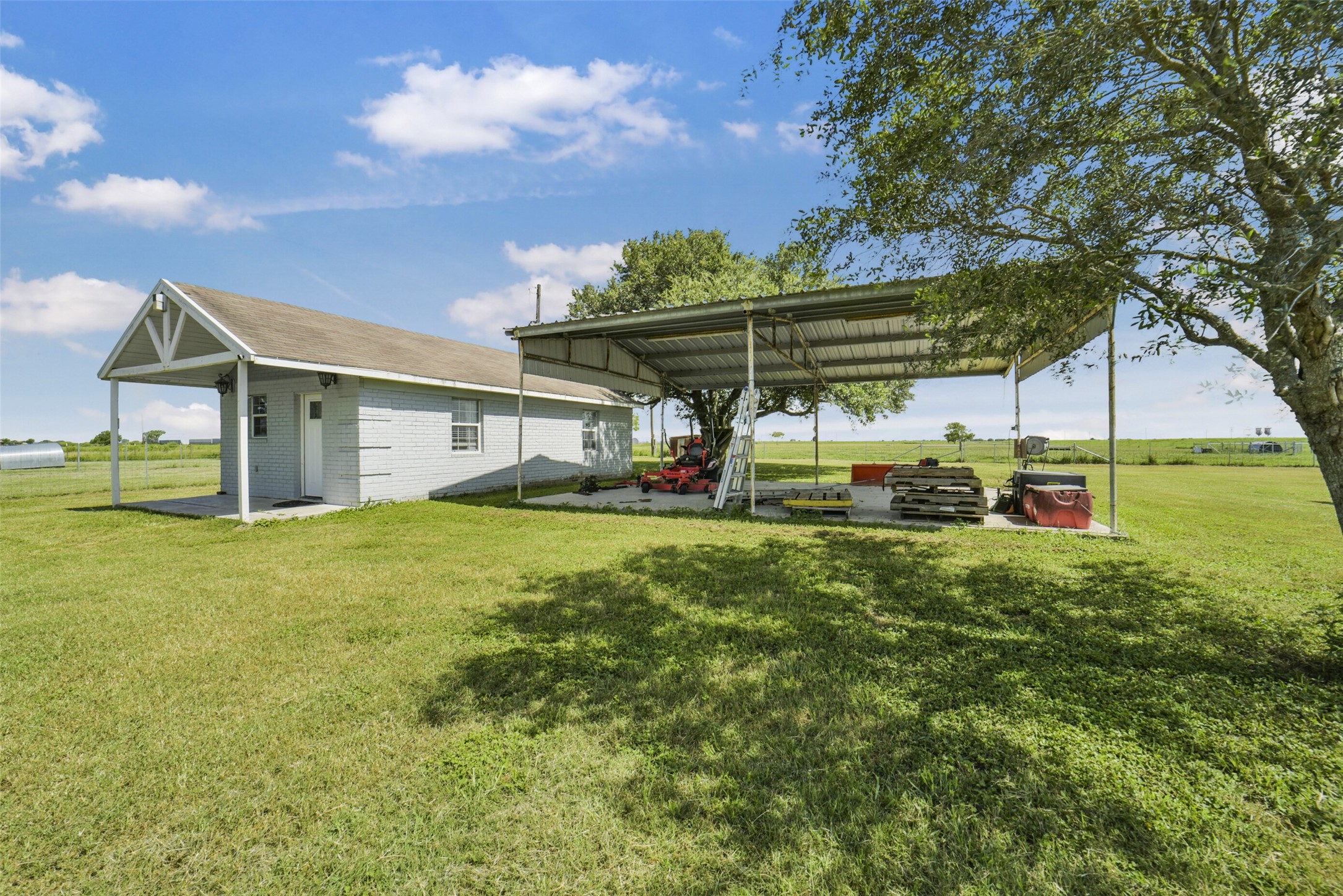 11301 South FM 441 Road El Campo, TX 77437 - Photo 32 of 43 3+ carport next to guest house.