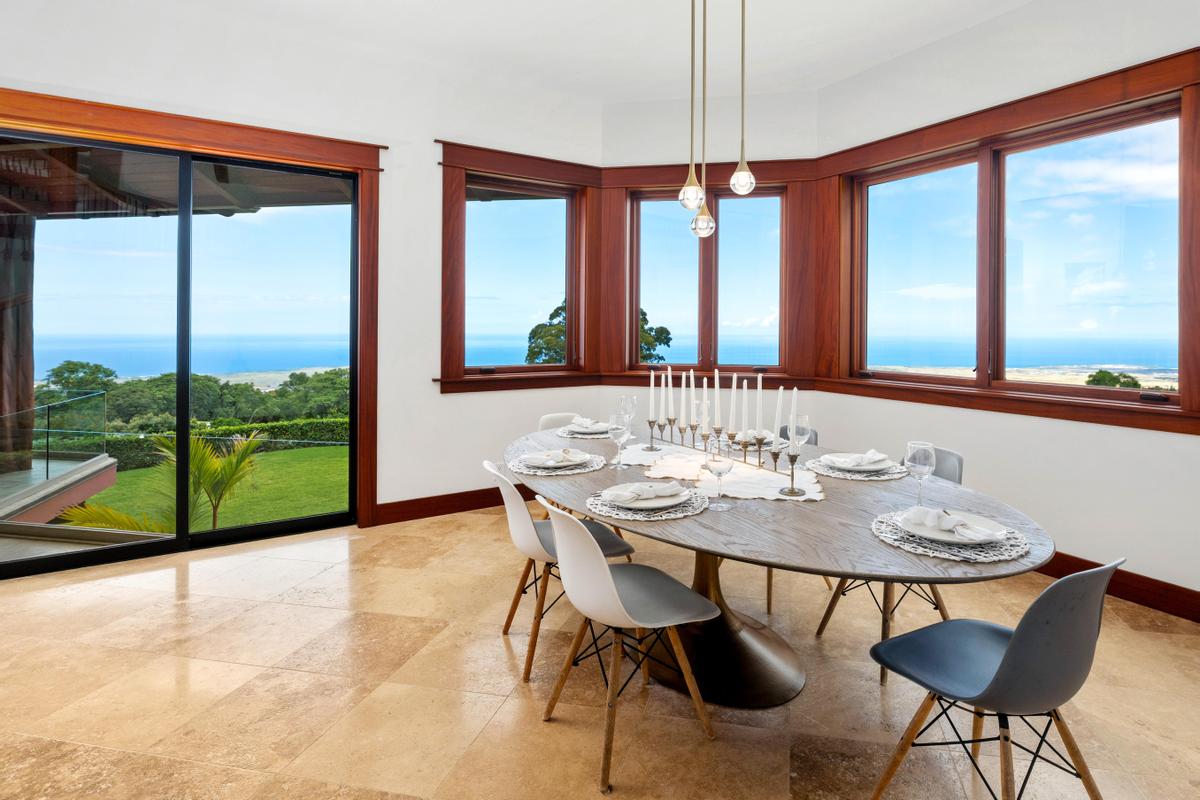 73-4695 Pilialoha Road Kailua-Kona, HI 96740 - Photo 11 of 30 a view of a dining room with furniture window and wooden floor
