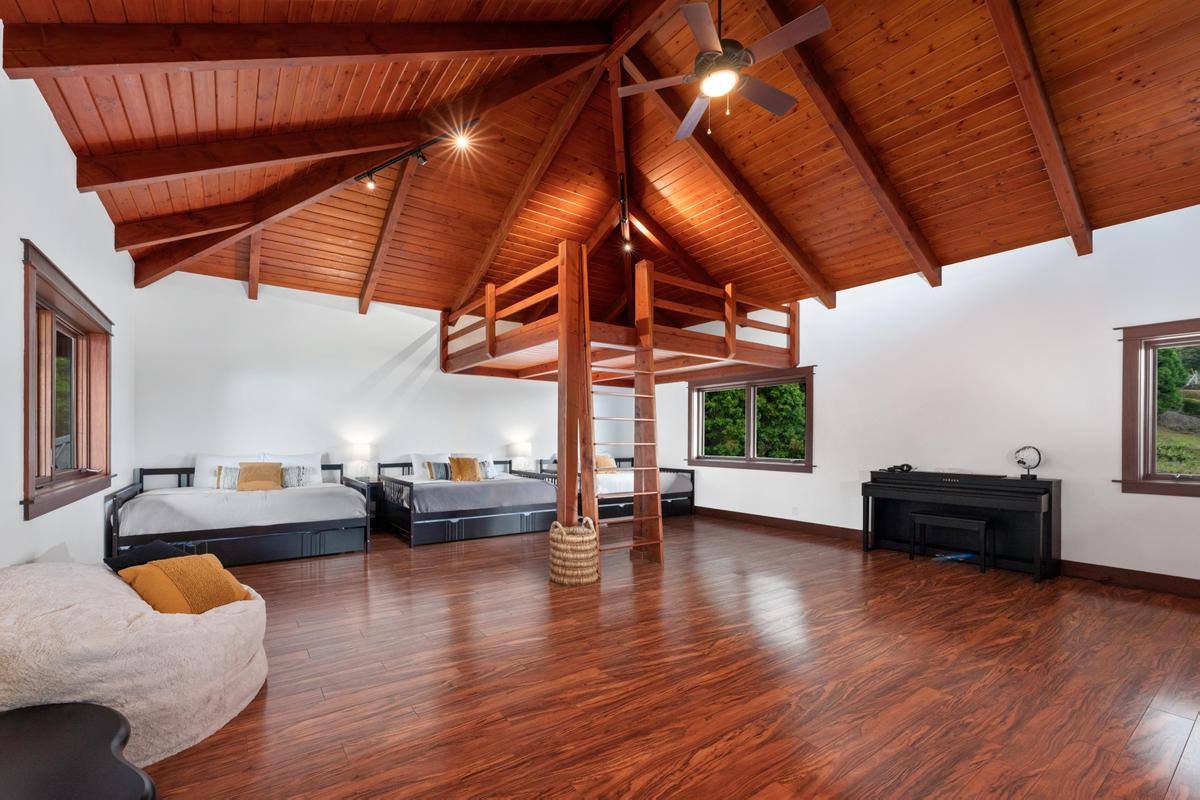 73-4695 Pilialoha Road Kailua-Kona, HI 96740 - Photo 16 of 30 a living room with furniture and wooden floor