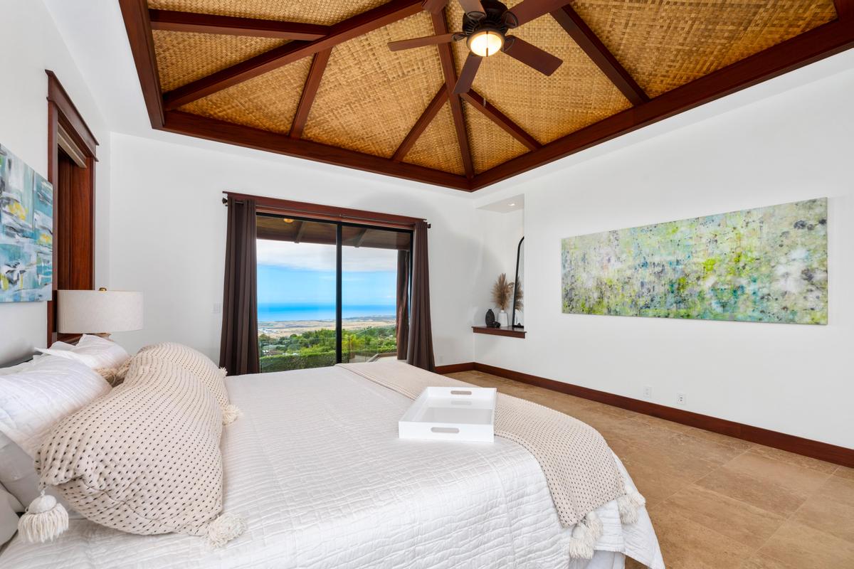 73-4695 Pilialoha Road Kailua-Kona, HI 96740 - Photo 18 of 30 a bedroom with a large bed and a large window