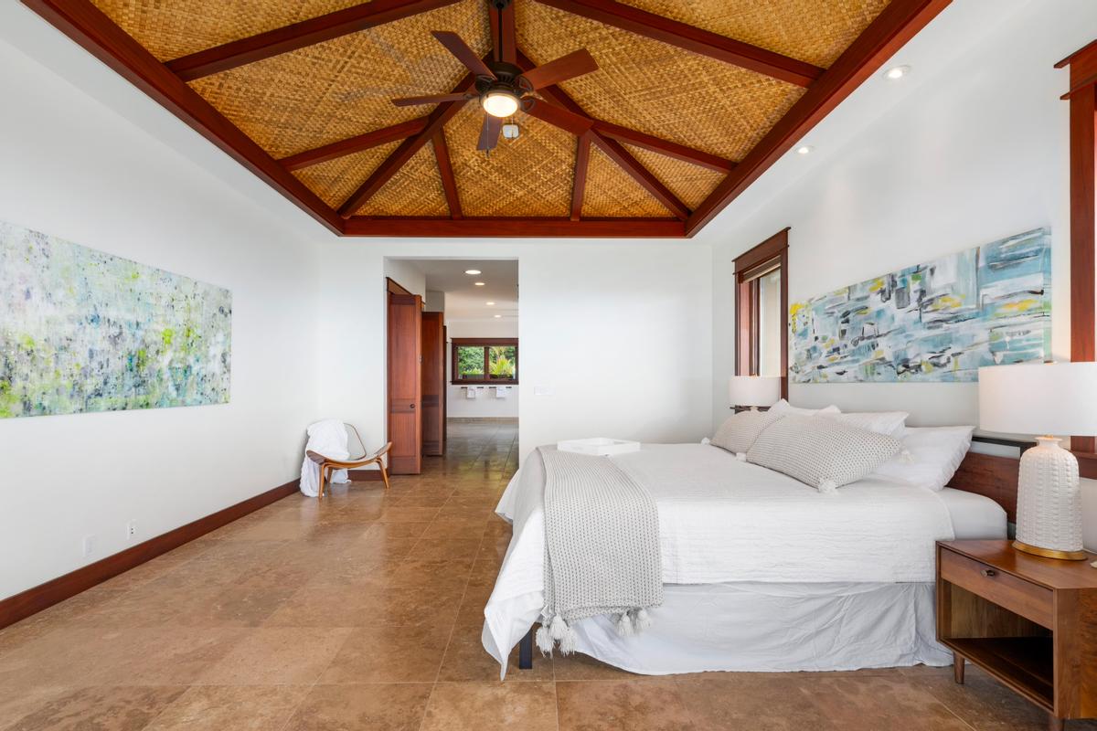 73-4695 Pilialoha Road Kailua-Kona, HI 96740 - Photo 19 of 30 a bed room with a bed and a painting on the wall