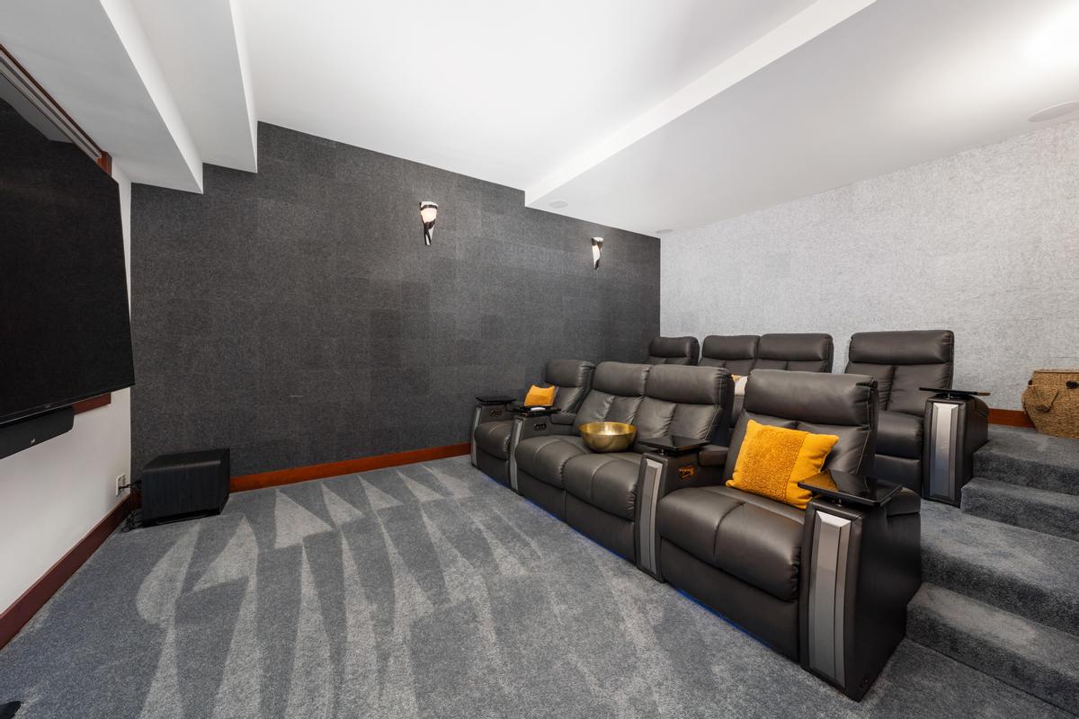 73-4695 Pilialoha Road Kailua-Kona, HI 96740 - Photo 27 of 30 a projector room with a couch and a flat screen tv