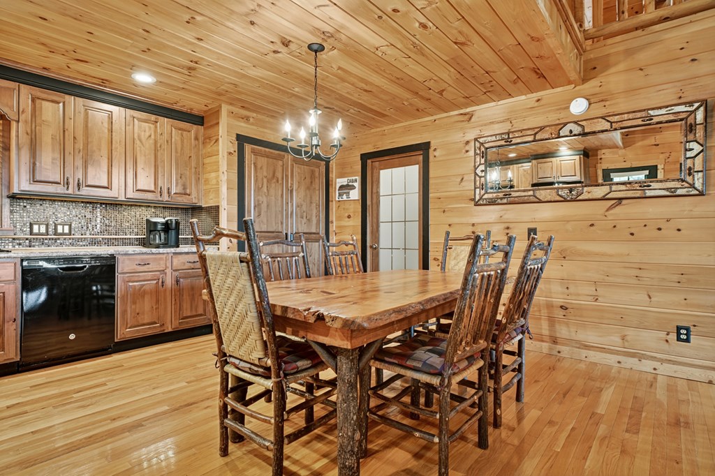 296 Overlook Road Blue Ridge, GA 30513 - Photo 36 of 65 a dining room with furniture and window