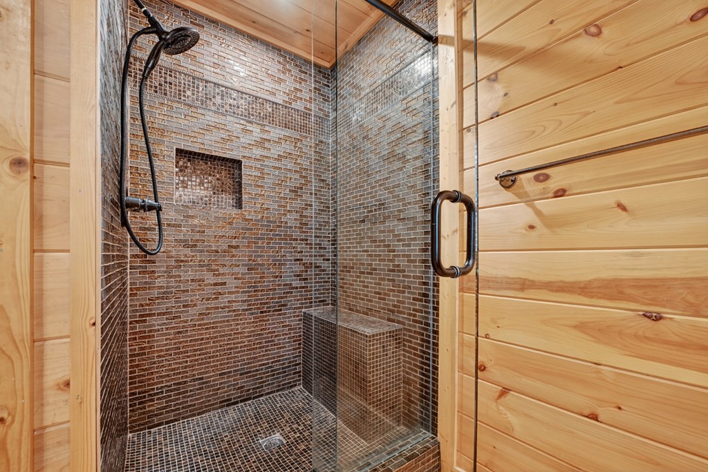 296 Overlook Road Blue Ridge, GA 30513 - Photo 49 of 65 a bathroom with a shower