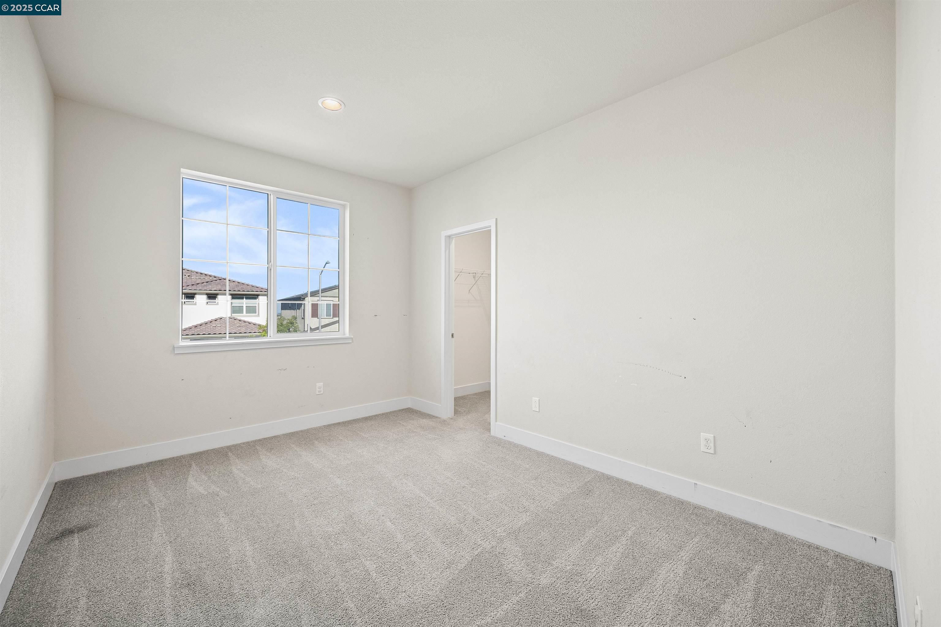5541 Promontory Way Antioch, CA 94531 - Photo 16 of 59 a view of an empty room with a window