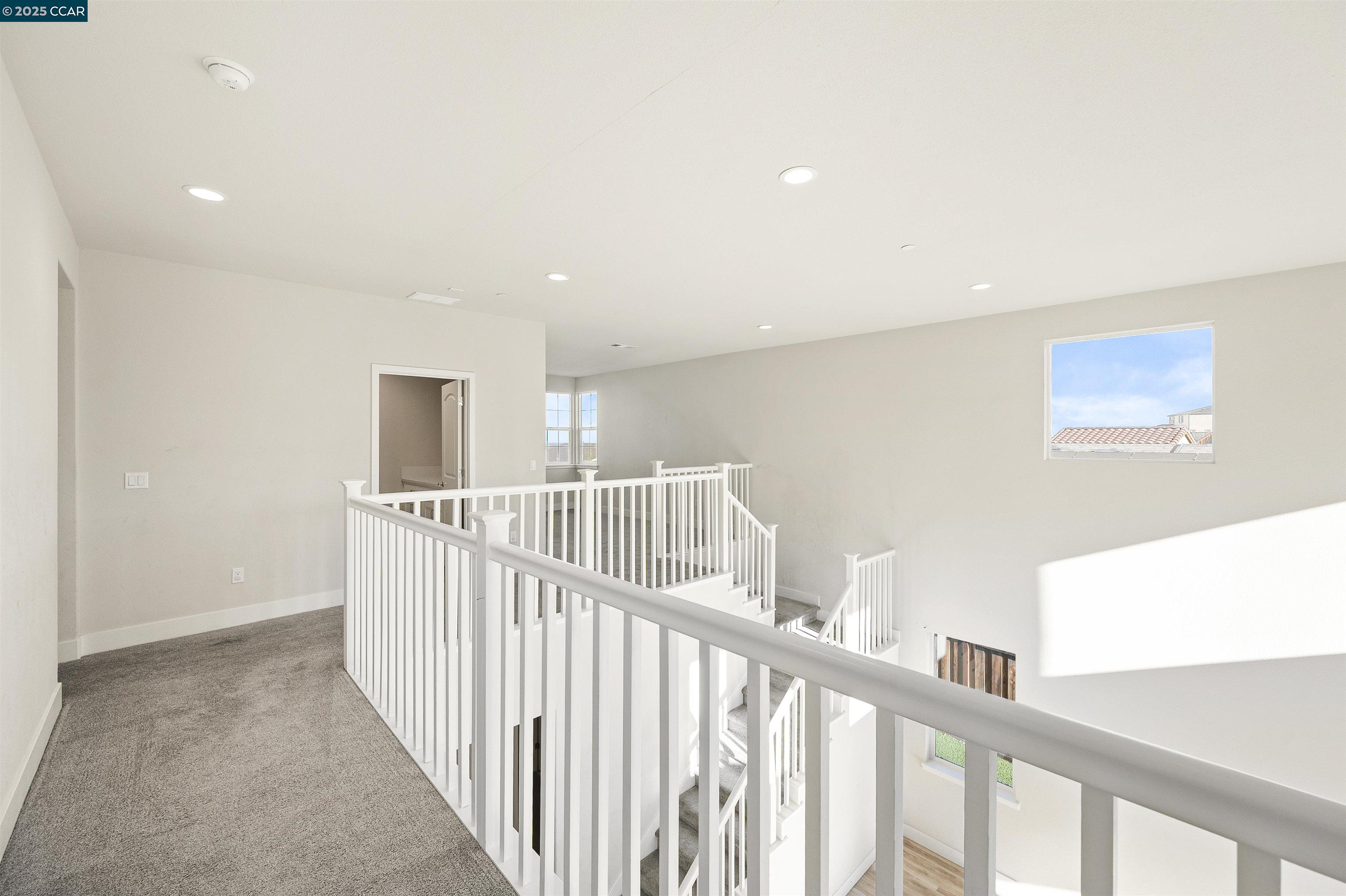 5541 Promontory Way Antioch, CA 94531 - Photo 19 of 59 a view of a hallway with workspace
