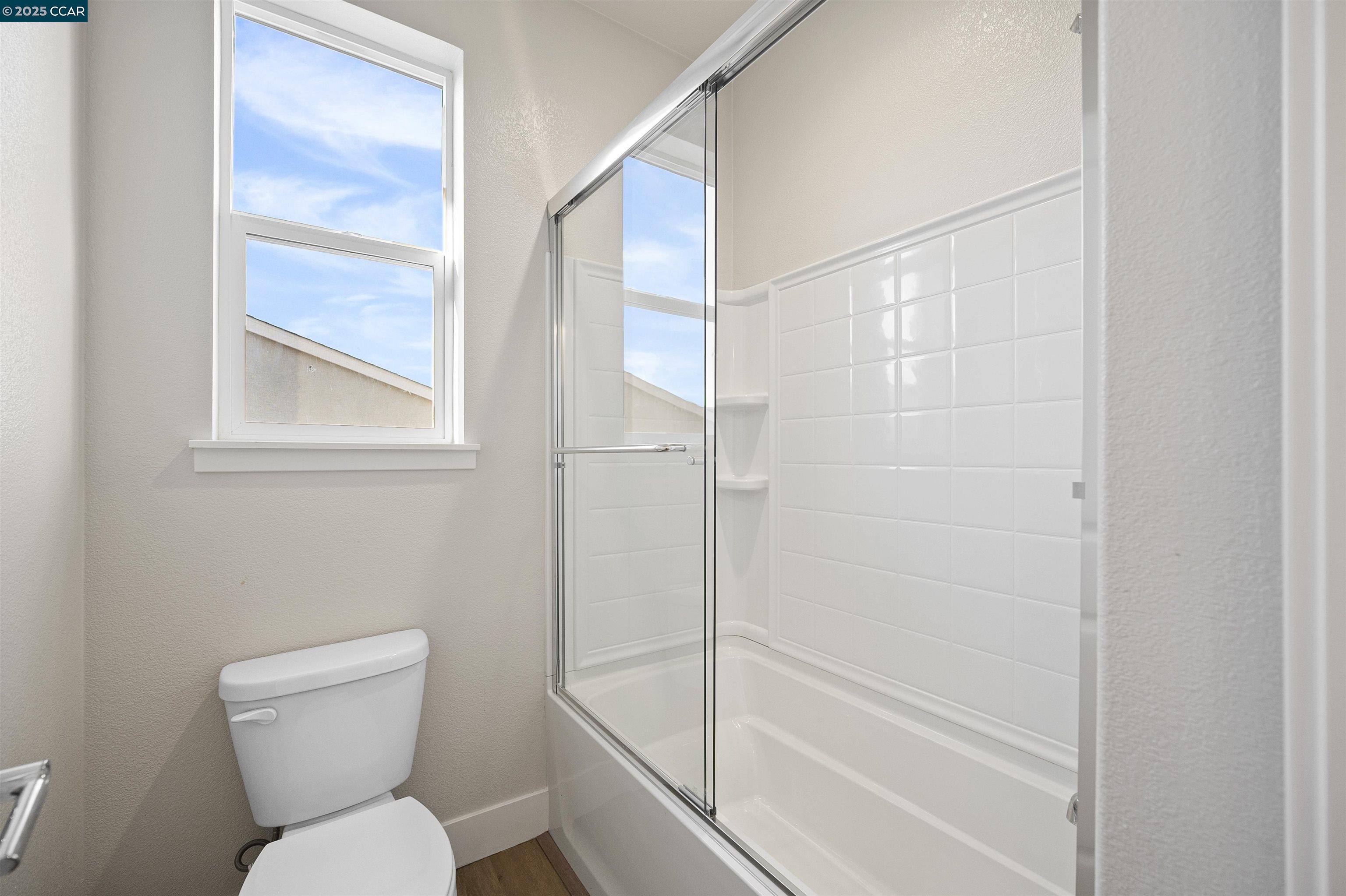 5541 Promontory Way Antioch, CA 94531 - Photo 26 of 59 a bathroom with a toilet and a shower