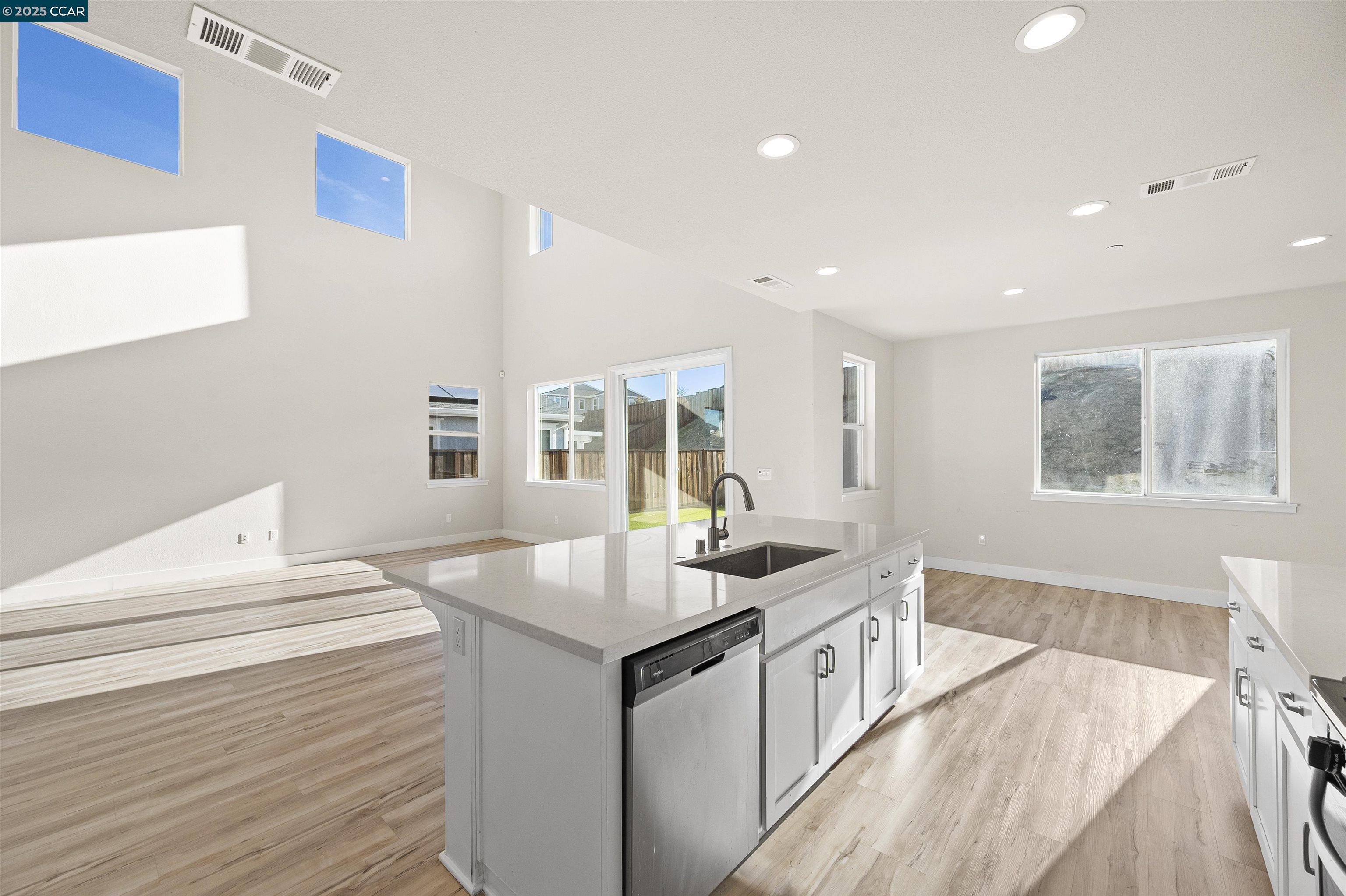 5541 Promontory Way Antioch, CA 94531 - Photo 42 of 59 a kitchen with a sink and a stove top oven