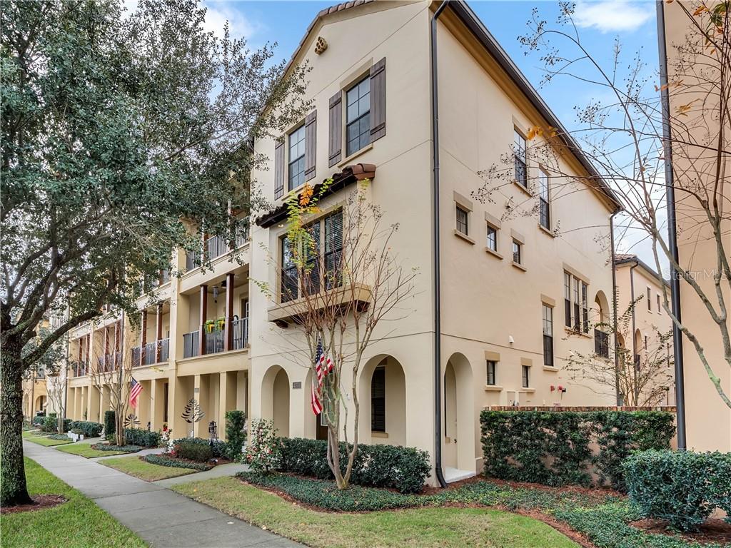 4530 Lower Park Road, Unit 3 Orlando, FL 32814 - Photo 1 of 1 a front view of a multi story residential apartment building with yard and green space