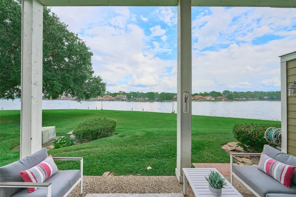 a view of a lake with a big yard