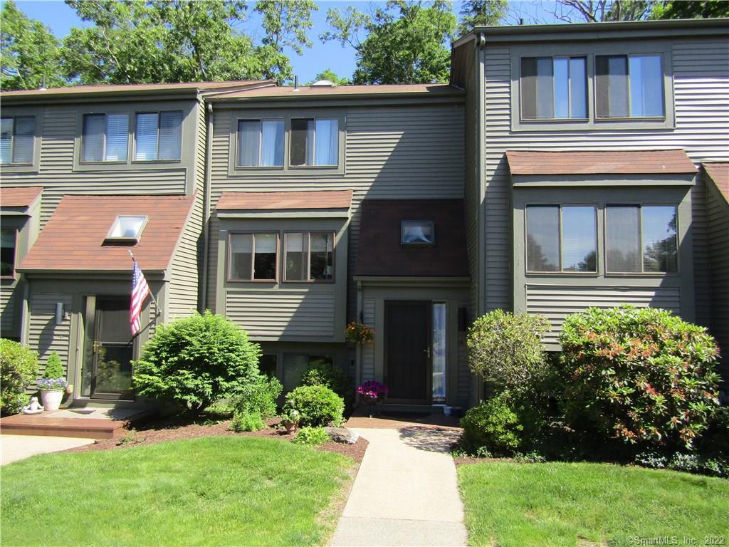48 Wickham's Fancy, Unit 48 Canton, CT 06019 - Photo 1 of 1 a house view with a garden space