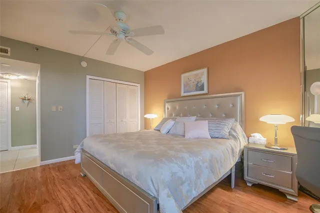 an aerial view of a house with a swimming pool and outdoor seating