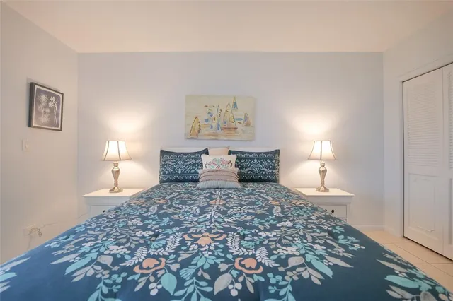 a big room with lots of furniture and a chandelier