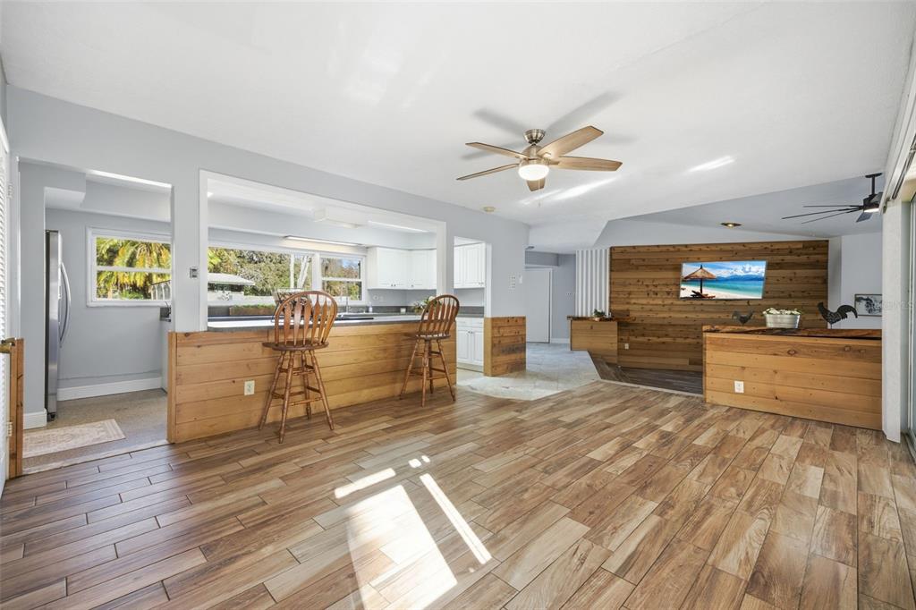 9214 Rhea Drive Odessa, FL 33556 - Photo 15 of 67 a living room with furniture and kitchen view