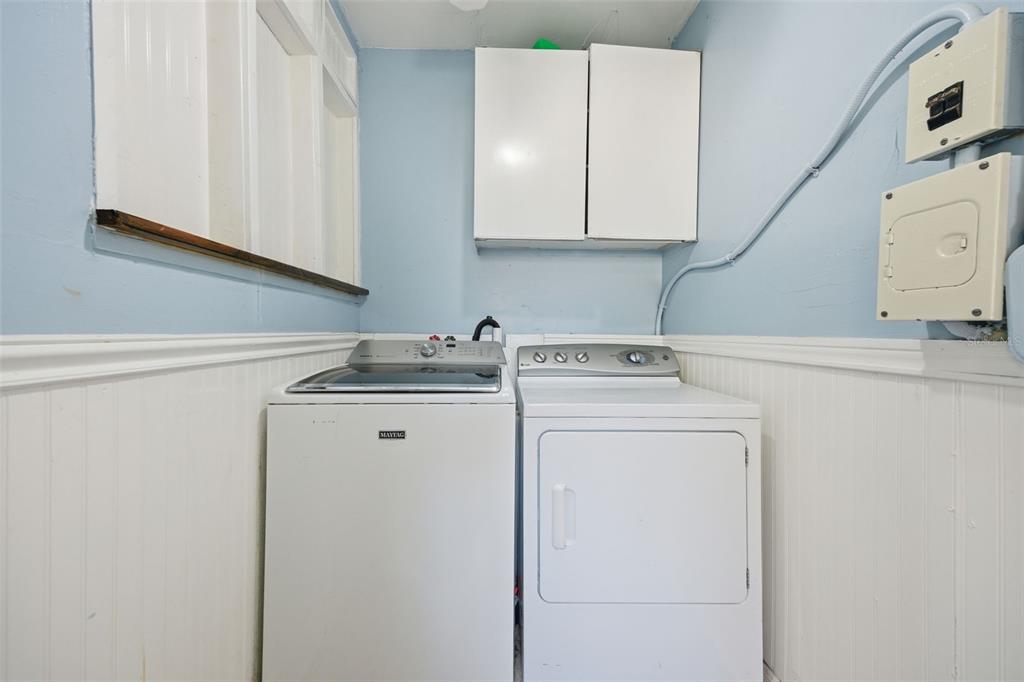 9214 Rhea Drive Odessa, FL 33556 - Photo 43 of 67 a utility room with dryer and washer