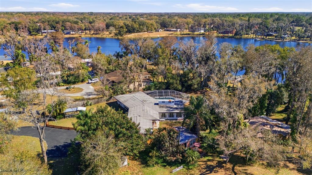 9214 Rhea Drive Odessa, FL 33556 - Photo 59 of 67 a view of a lake with a mountain in the background