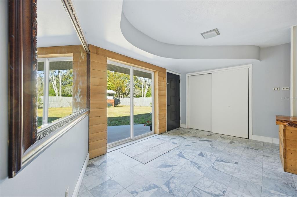 9214 Rhea Drive Odessa, FL 33556 - Photo 8 of 67 a view of an empty room and window