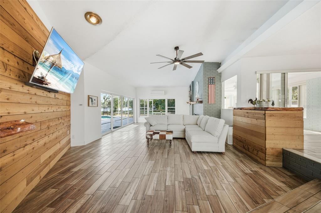 9214 Rhea Drive Odessa, FL 33556 - Photo 10 of 67 a living room with furniture and a large window