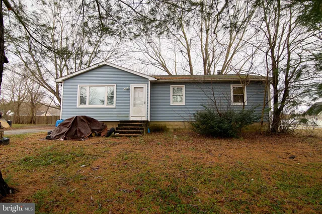 a house view with a outdoor space