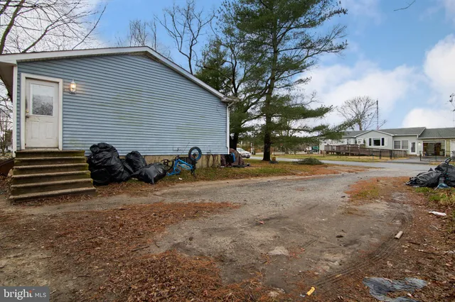 a view of street with parked cars