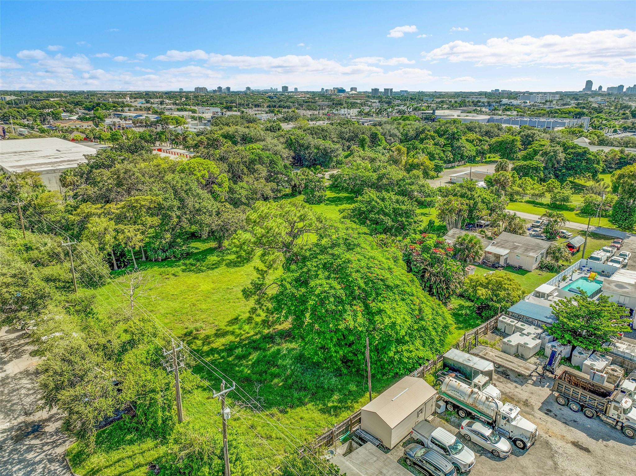 1865 Donnell Road West Palm Beach, FL 33409 - Photo 8 of 10 a view of a city with lush green forest