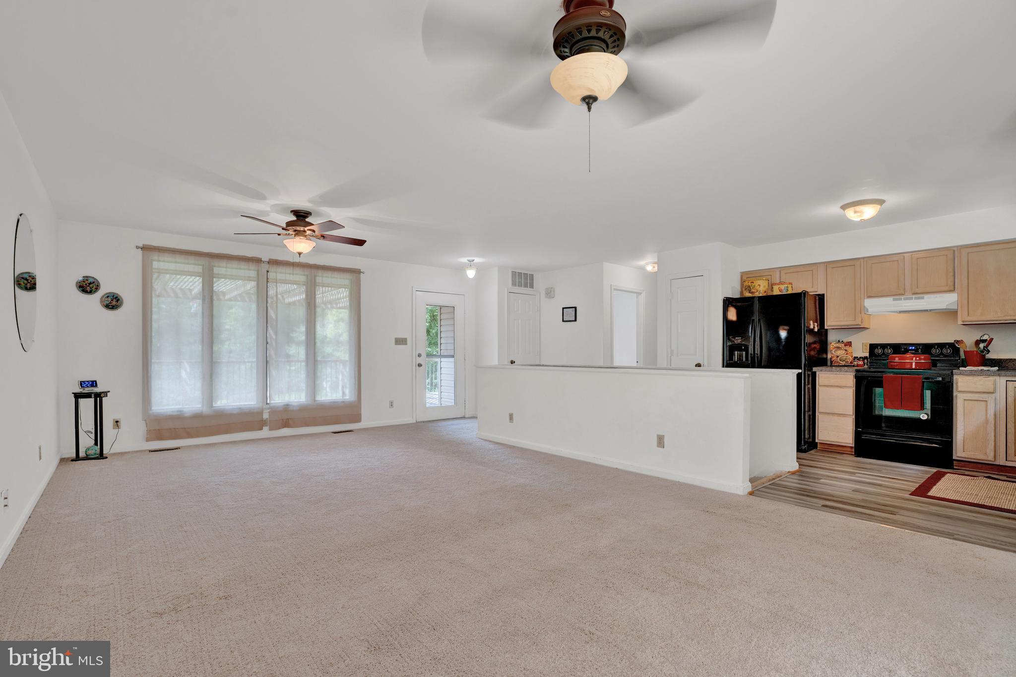 10365 River Road Rixeyville, VA 22737 - Photo 24 of 52 Main Level - Lliving Room with adjoining Kitchen