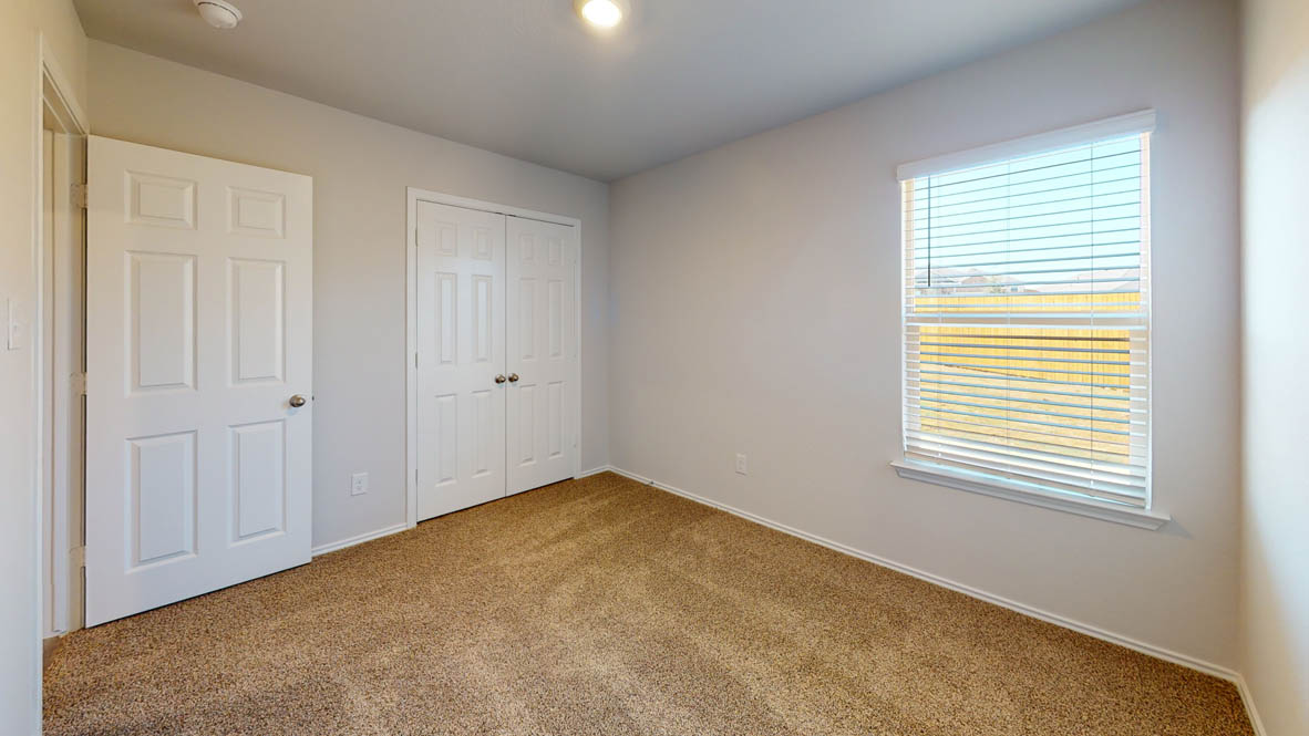 246 Water Wl Road Burnet, TX 78611 - Photo 10 of 16 a view of an empty room with a window