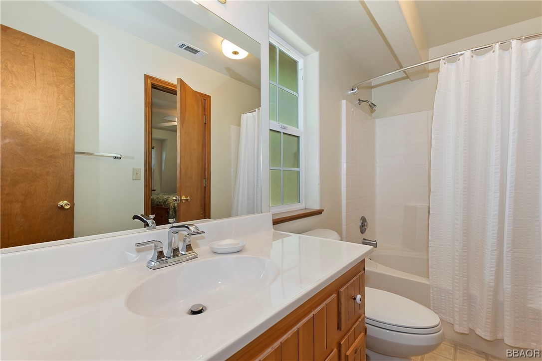 189 Pine Ridge Road Crestline, CA 92325 - Photo 17 of 30 a bathroom with a sink toilet and shower