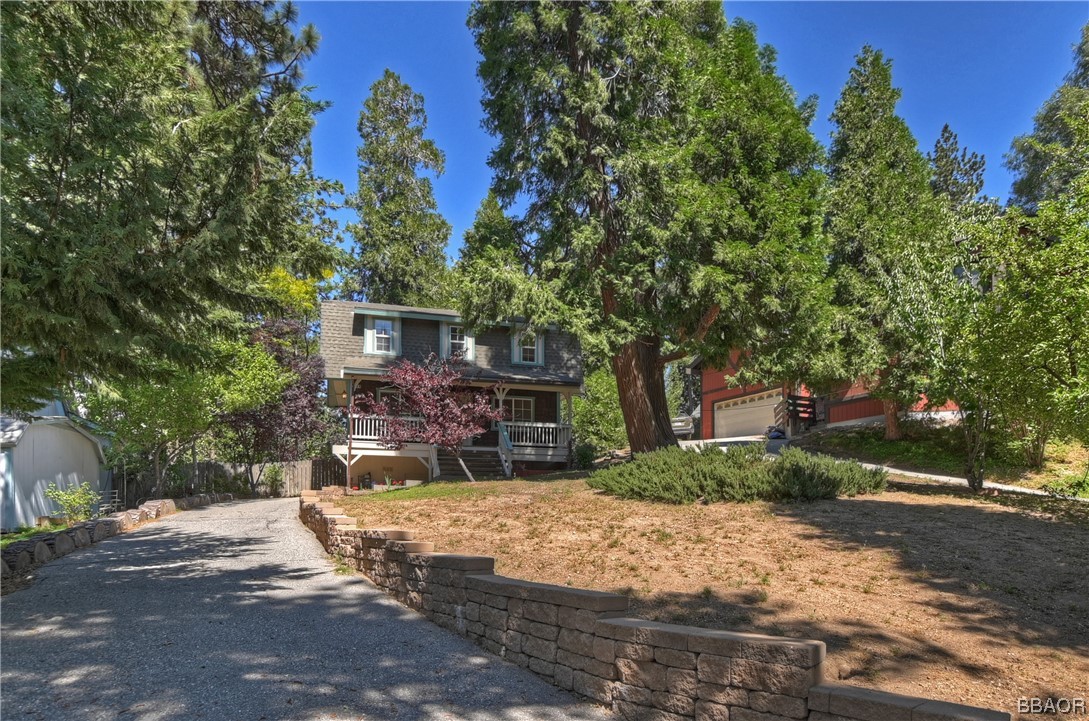 189 Pine Ridge Road Crestline, CA 92325 - Photo 2 of 30 a view of a yard with plants and trees