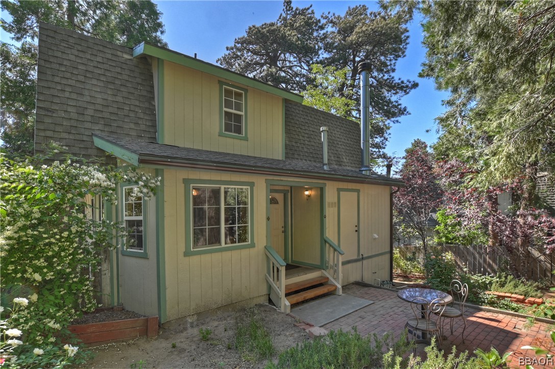 189 Pine Ridge Road Crestline, CA 92325 - Photo 23 of 30 a view of a house with a yard and large tree