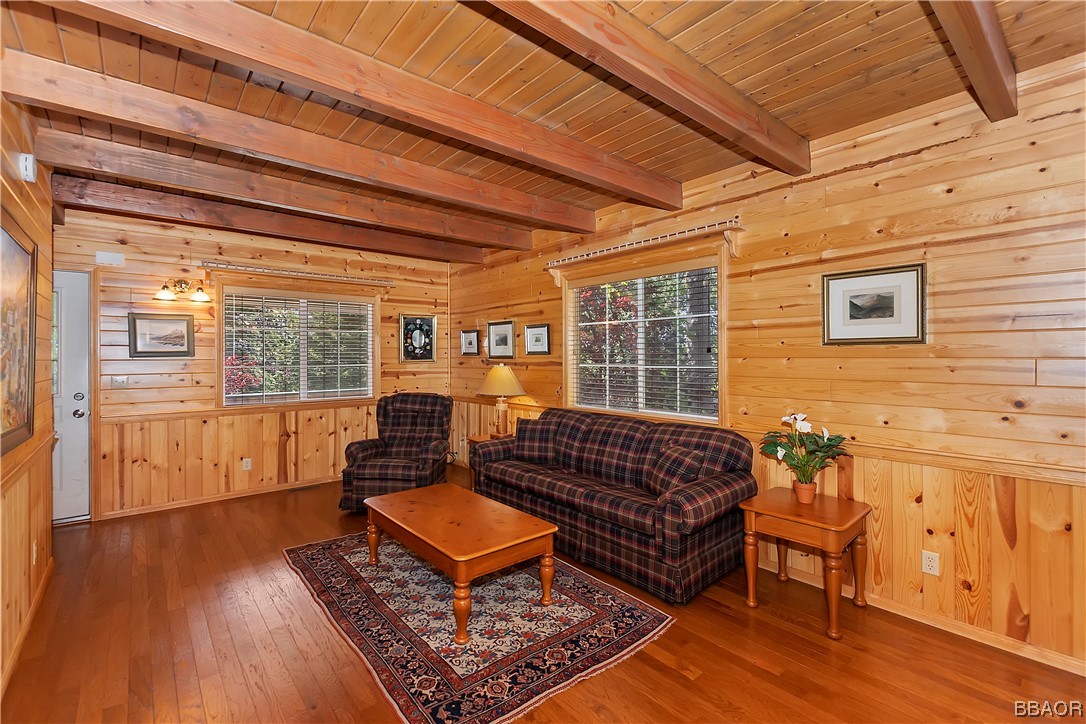 189 Pine Ridge Road Crestline, CA 92325 - Photo 7 of 30 a living room with furniture a wooden floor and next to a window