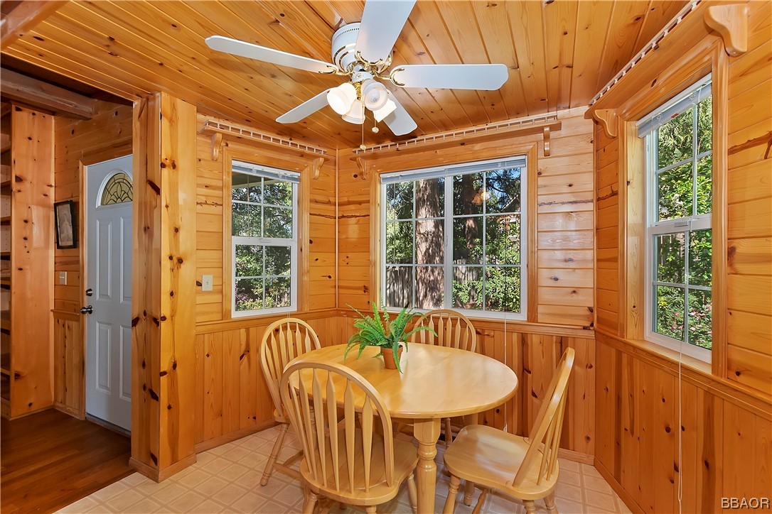 189 Pine Ridge Road Crestline, CA 92325 - Photo 9 of 30 a view of a dining room with furniture window and outside view