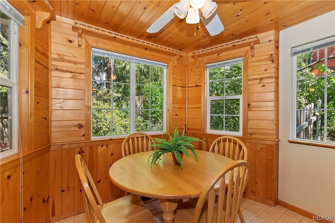 189 Pine Ridge Road Crestline, CA 92325 - Photo 10 of 30 a view of a dining room with furniture window and outside view
