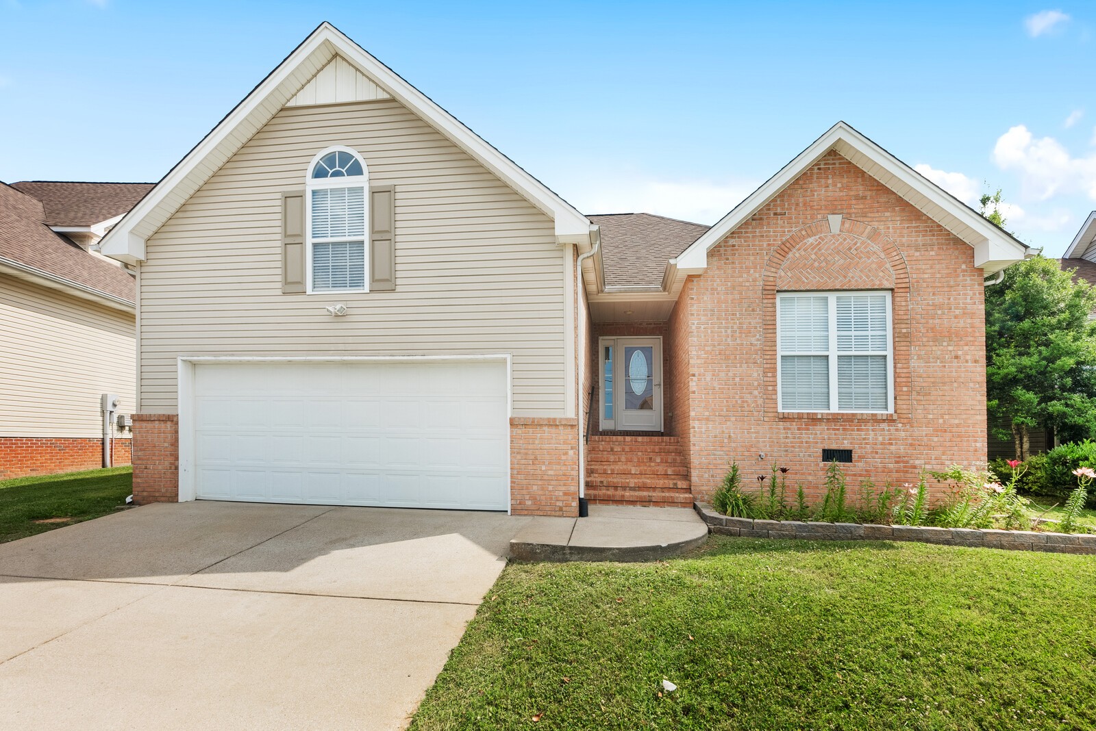 509 Berry Circle Springfield, TN 37172 - Photo 2 of 20 a view of an house with backyard space and garden