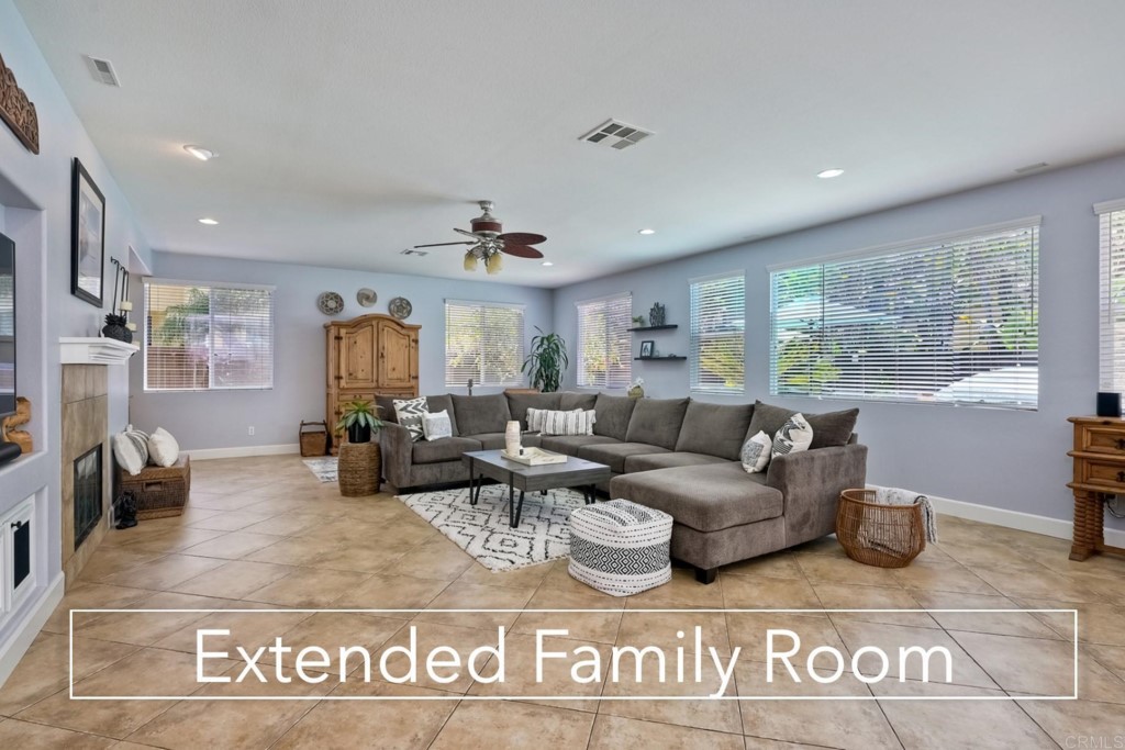 1738 Star Crest Place San Marcos, CA 92078 - Photo 11 of 51 a living room with furniture and a large window