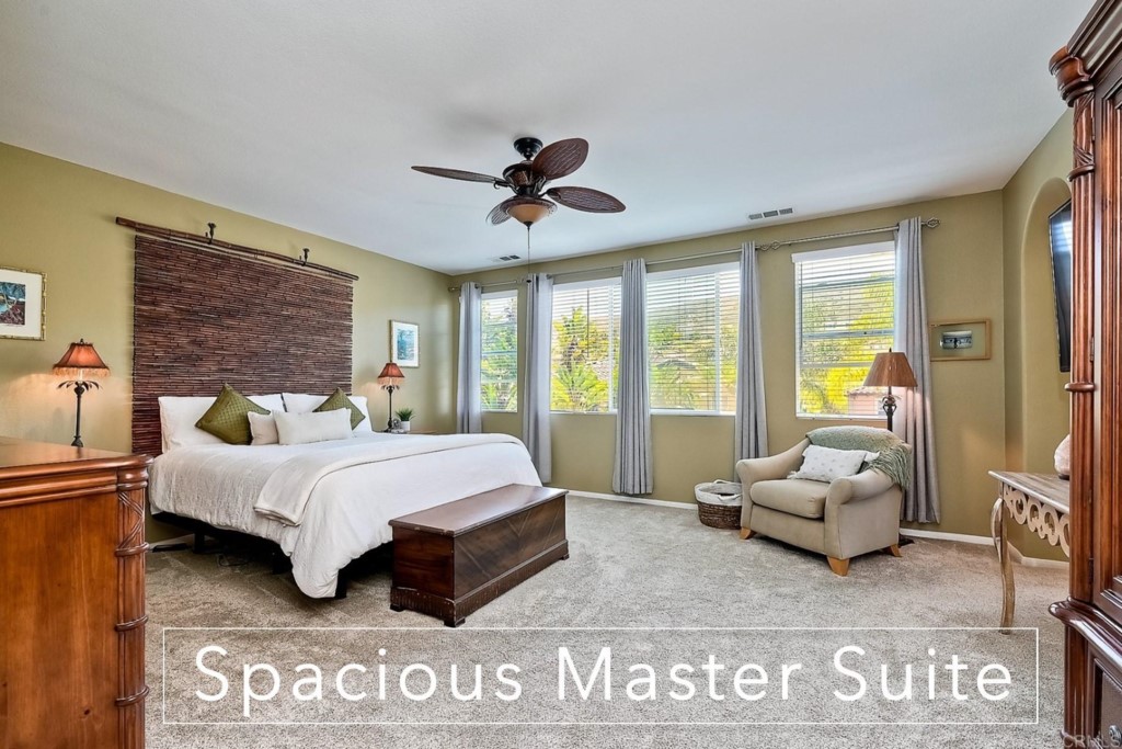 1738 Star Crest Place San Marcos, CA 92078 - Photo 25 of 51 a spacious bedroom with a bed and glass window