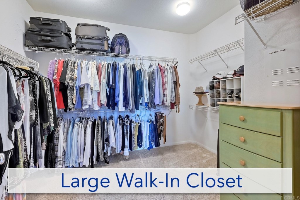 1738 Star Crest Place San Marcos, CA 92078 - Photo 32 of 51 a view of walk in closet with clothes and shoes