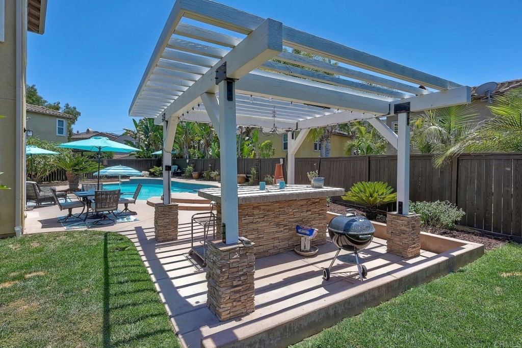 1738 Star Crest Place San Marcos, CA 92078 - Photo 38 of 51 a view of a chair and tables in the patio