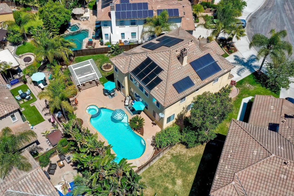 1738 Star Crest Place San Marcos, CA 92078 - Photo 44 of 51 an aerial view of a house with swimming pool and garden