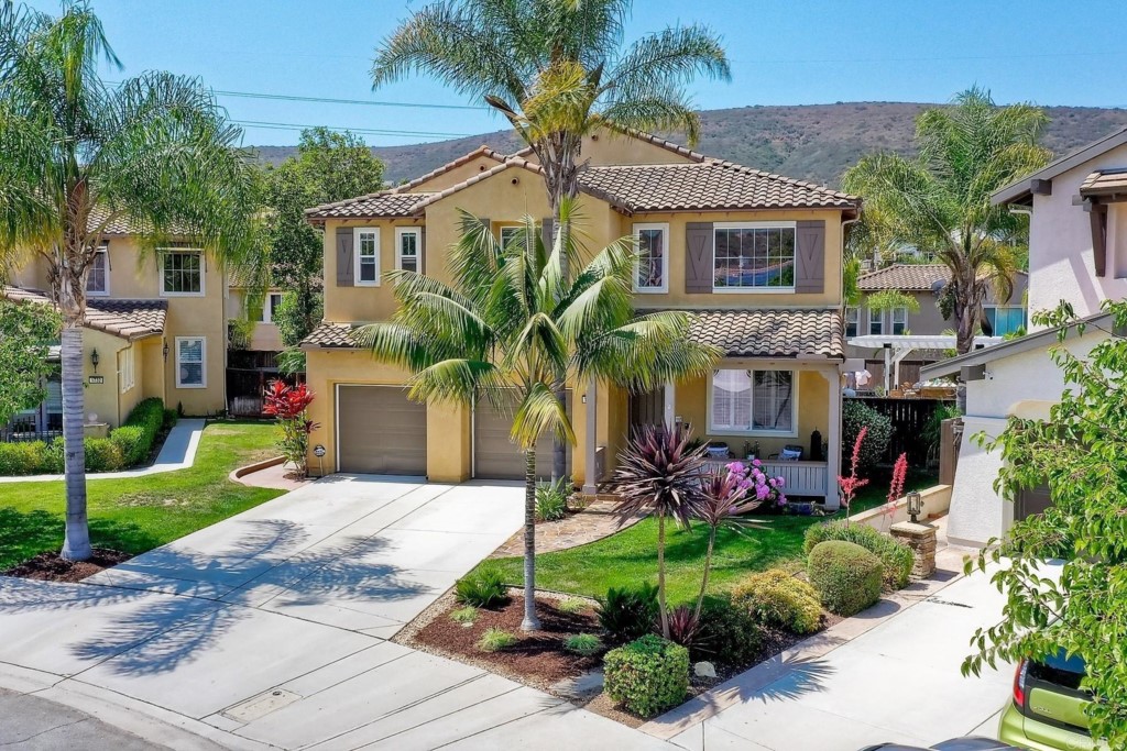 1738 Star Crest Place San Marcos, CA 92078 - Photo 6 of 51 a front view of house with yard and green space