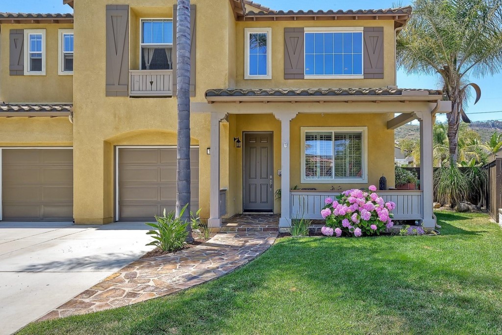 1738 Star Crest Place San Marcos, CA 92078 - Photo 7 of 51 a front view of a house with garden