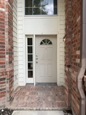 a front view of a house with a door