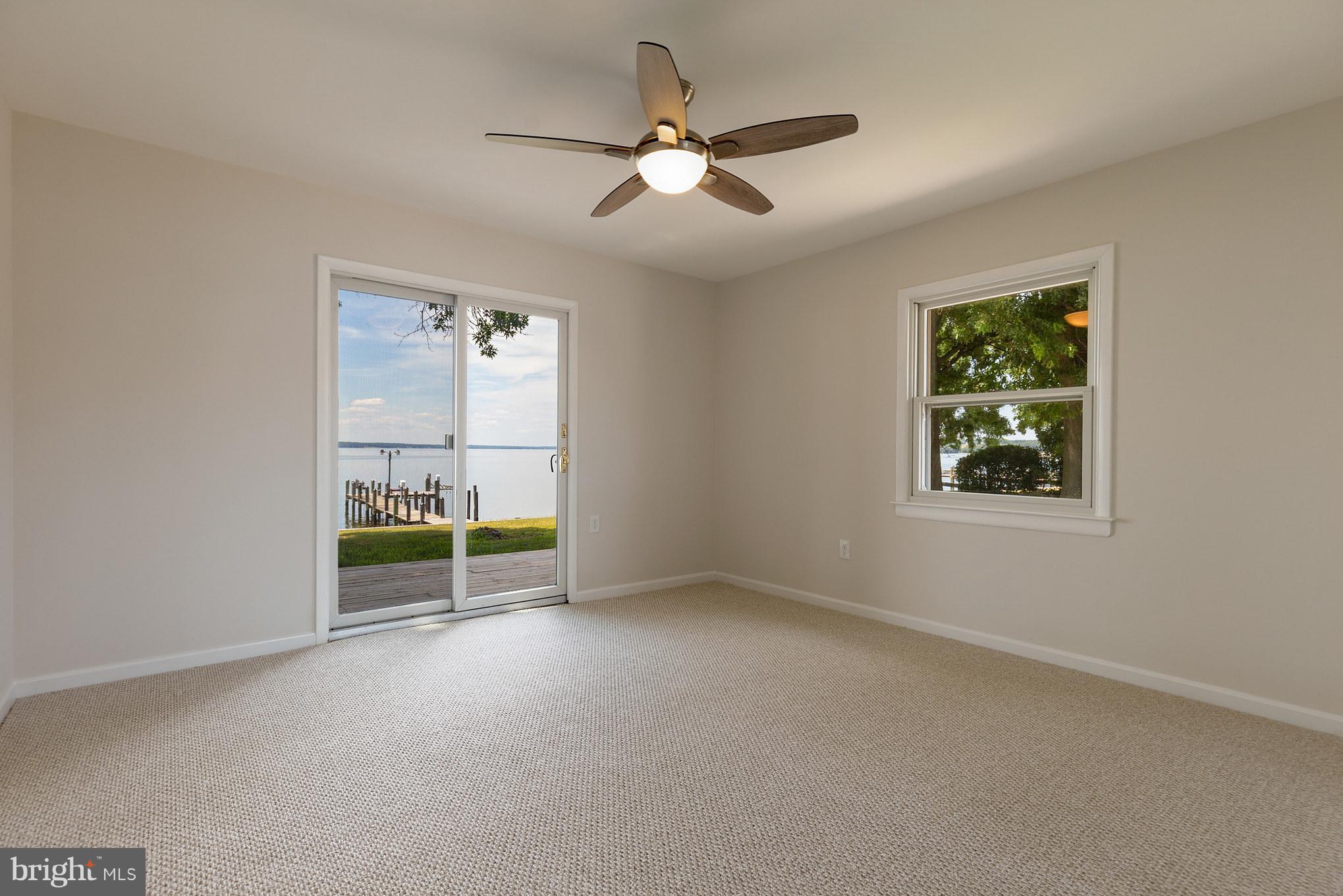 9335 River View Road Broomes Island, MD 20615 - Photo 14 of 30 Bedroom 2 - walkout to deck facing Patuxent River