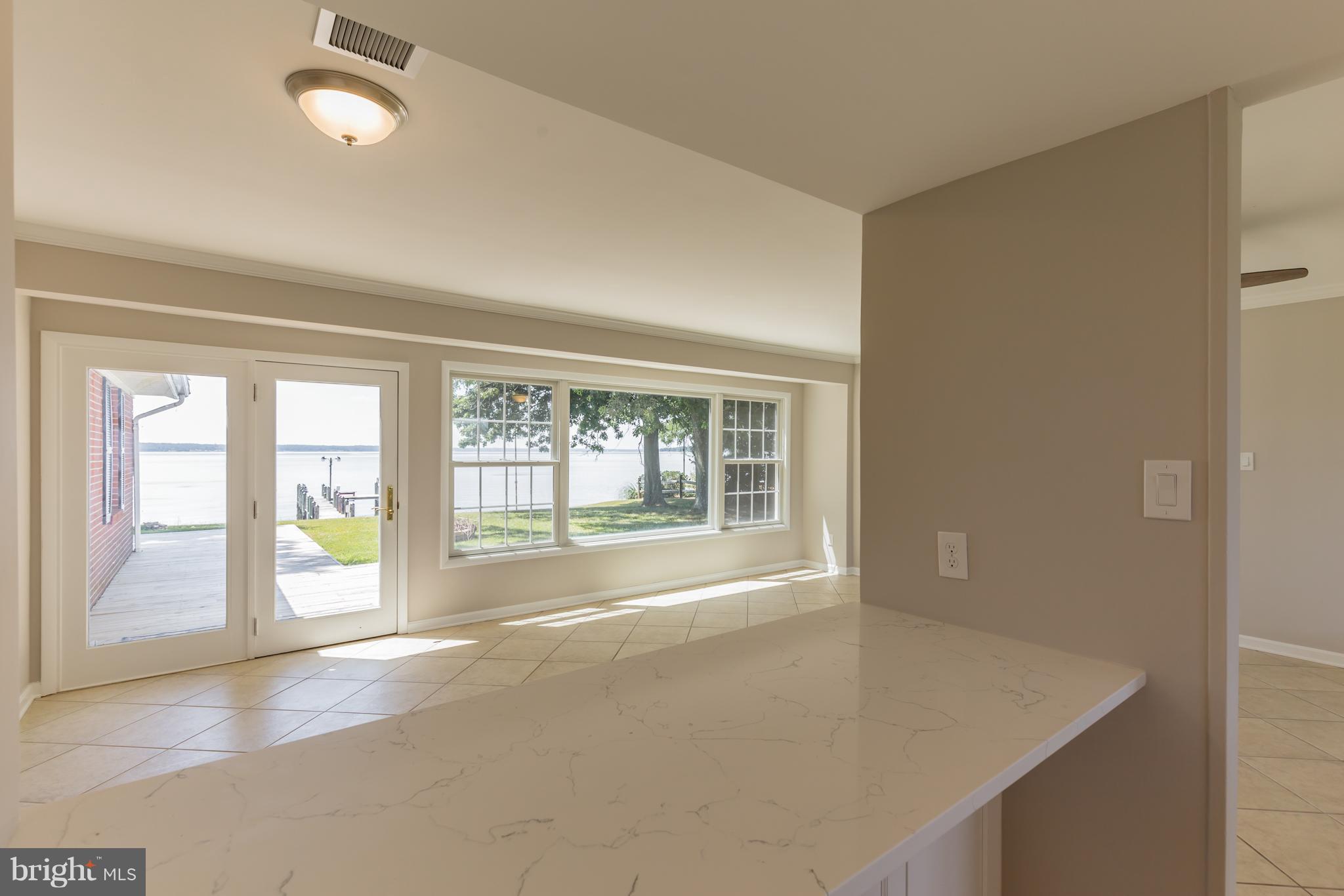 9335 River View Road Broomes Island, MD 20615 - Photo 8 of 30 Kitchen Bar and spectacular views from kitchen!
